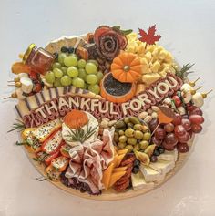 a platter filled with lots of different types of food