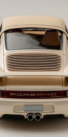 the rear end of an old model porsche