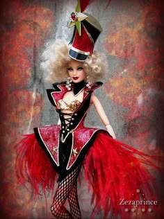 a barbie doll wearing a red and black dress with feathers on it's head