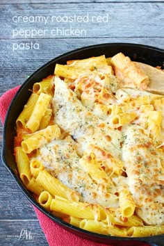 a skillet filled with pasta covered in cheese