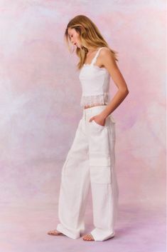 Introducing the Pora Pant. These sophisticated pants are designed from a crisp linen fabric for easy and comfortable wear. The straight leg cargo pant features pockets on each leg, pockets on the side and a center front zipper. Linen Cargo Pants, Cargo Pants Sale, Peplum Hem, Silk Charmeuse, Cargo Pant, Front Tie Top, Top Sales, Antique White, Linen Fabric