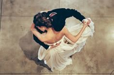 an aerial view of a couple dancing on the dance floor