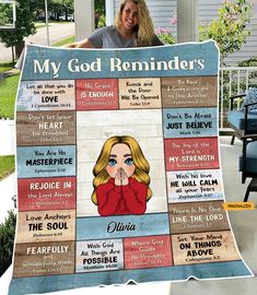 a woman is holding up a blanket that says, my god reminders on it