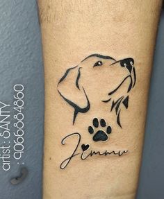 a dog's paw and name tattoo on the arm