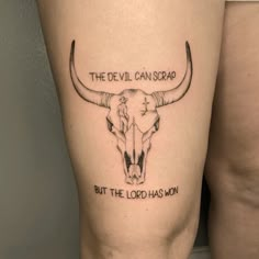 a bull skull with the words, the devil can soar but the lord has won