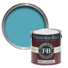 the farrow and ball paint in blue is shown on a white background with an open can