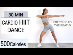 a woman is doing cardio hit dance