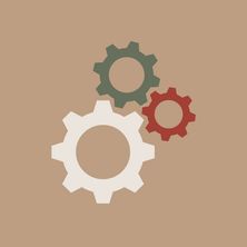 three gears sitting on top of each other in the middle of a brown and white background