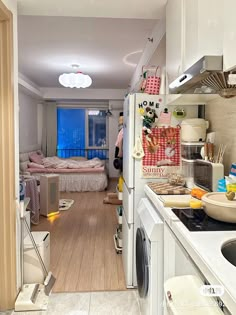 the kitchen is clean and ready to be used as a living room or dining area