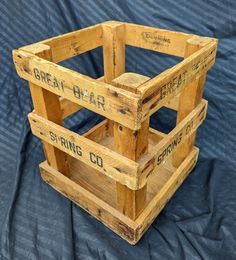 three wooden crates stacked on top of each other