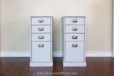 two white filing cabinets sitting on top of a hard wood floor