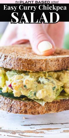 a close up of a sandwich with egg salad on it