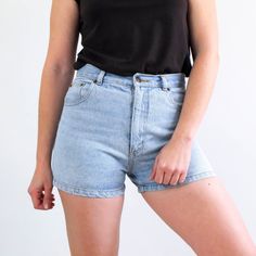 Vintage high waist shorts jeans in light blue of the 90's. This vintage women denim shorts has classic and streetstyle. The shorts is cotton fabric by John F. Gee in perfect vintage conditions. The modern size of this denim short is Medium - the waist contour fit is 29,9 in (76 cm) ** MEASURES FLAT ** Waist 14,9 in // 38 cm Hip 19,6 in // 50 cm Rise (front) 11,4 in // 29 cm Rise (back) 14,5 in // 37 cm Inner leg 2,7 in // 7 cm Length 13,3 in // 34 cm Bottom width 11,4 in // 29 cm Reference: Mode Retro Denim Jean Shorts For Summer, Retro High Waist Medium Wash Shorts, Retro High-waist Medium Wash Shorts, Medium Wash High-waisted Shorts, Retro High Waist Medium Wash Jean Shorts, Retro High Waist Jean Shorts For Summer, Retro High-waist Jean Shorts For Summer, Retro Short Denim Shorts, Fitted High Waist Light Wash Jean Shorts