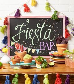 the fiesta bar is decorated with colorful tassels