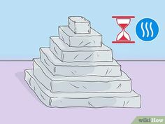 a pyramid made out of rocks with an hourglass on the top and a blue sign above it