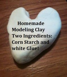 a heart shaped rock with the words homemade modeling clay two ingredients corn starch and white glue