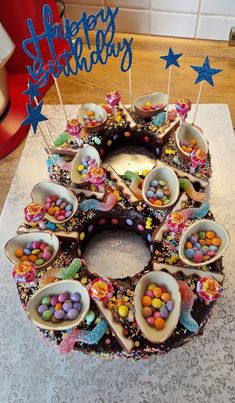 a birthday cake decorated with candy and candies