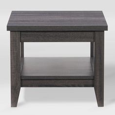 the end table is made from wood and has two shelves on each side, with one drawer