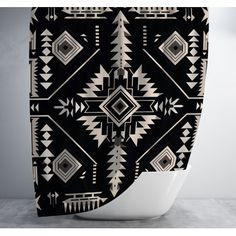 a black and white shower curtain with an abstract design on the front, featuring geometric shapes