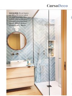 the bathroom is decorated in blue and white with wood accents on the walls, along with an open shower door