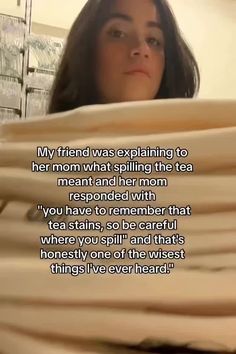 a woman sitting in front of stacks of folded sheets with the caption, my friend was explaining to her mom what spilling the tea meant and her mom