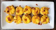 bacon and cheese muffins on a white plate