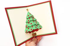 This pop up card features a festive Christmas tree. The front of the card is blank so that you can add your own design. Includes assembly instructions. The card comes in 4x6 or 5x7 options, or resize to fit your needs. If you wish to resize the card, please make sure to scale all the pieces at the same time so that they still fit together. If you would like to see a tutorial video of how to assemble this product, please visit this video link: https://youtu.be/xHeFYYzfGT4 This is an SVG file for Christmas Tree Pop Up Card, Tree Pop Up Card, Photo Transfer To Paper, Pop Up Christmas Cards, Card Svg, Workshop Ideas, Daycare Crafts, Christmas Graphics, Christmas Gift Card