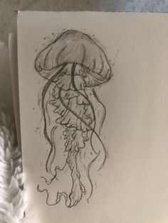 a drawing of a jellyfish on a piece of paper