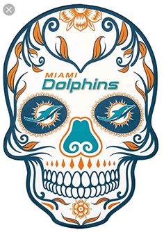 a miami dolphins skull with an orange and blue design on the side, in front of a white background