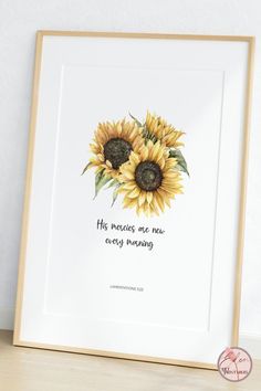 a watercolor painting of two sunflowers with a quote on it