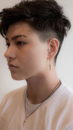 Dagger Earring - Sterling Silver – Futaba Hayashi Tattoo Symbolism, Tomboy Haircut, Close Combat, Dagger Necklace, Symbol Of Protection, Dagger Earrings, Photographie Portrait Inspiration, Short Hair Undercut, Men's Haircut