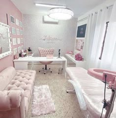 a room with pink furniture and pictures on the wall, including a couch, chair, desk, and mirror