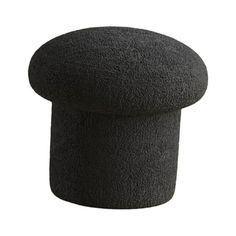 a black stool that is made out of foam and has a round shape on the top