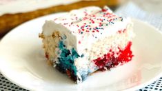 a piece of cake with red, white and blue sprinkles on it