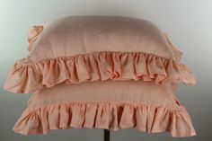 two pillows stacked on top of each other