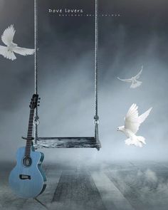 two white birds flying next to a blue guitar hanging from a swing with strings attached