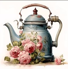 a blue tea pot with pink roses on it