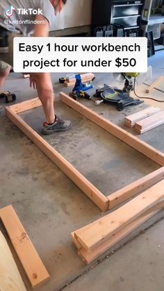 a man is working on some wood in his workshop with the words easy 1 hour workbench project for under $ 50