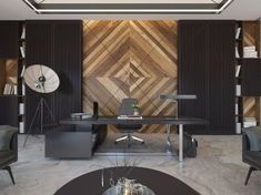 a modern office with wood paneled walls and leather chairs in front of the desk