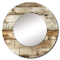 a round mirror sitting on top of a wooden wall