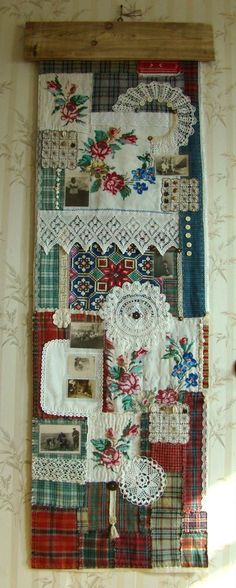 a wall hanging made up of different types of fabric and laces with pictures on it