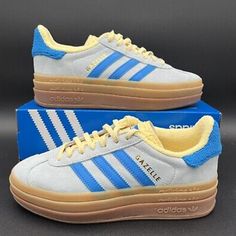 Color: Light Blue/Yellow Shoe Width: Medium/B Design: Iconic Gazelle Silhouette With Bolder Details Serrated 3-Stripes And A Metallic-Gold "Gazelle" Classic Lace Closure With A Premium Soft Suede Upper Additional Details: Runs Big, Size Down 1/2 Size Brand : Adidas Ship In Bussiness Day Adidas Gazelle Blue, Yellow Trainers, Yellow Adidas, Adidas Shoes Originals, Adidas Originals Women