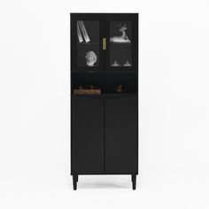 a black cabinet with glass doors and shelves