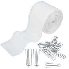 a roll of white fabric with pins and clips on it next to some clothes pins