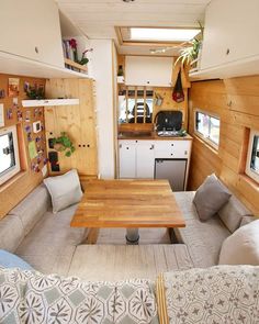 an instagram photo of a living room and kitchen in a tiny house on wheels