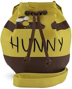 PRICES MAY VARY. Loungefly Winnie the Pooh Honey Pot Crossbody Faux Leather bag Adjustable strap Word Hunny is embroidered Officially licensed Standard Sized Winnie the Pooh Honey Pot Crossbody with Adjustable straps. Winnie The Pooh Shoes Womes, Disney Drawstring Bag, Winnie The Pooh Storage, Winnie The Pooh Cute Gifts, Whinnie The Pooh Basket, Owl Costume From Winnie The Pooh, Winnie The Pooh Birthday Goody Bags, Winnie The Pooh Handbag, Loungefly Winnie The Pooh