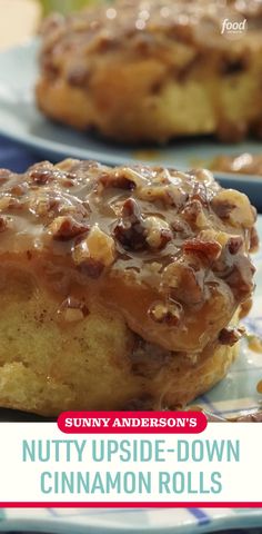 a close up of a doughnut on a plate with the title suny anderson's nutty upside - down cinnamon rolls