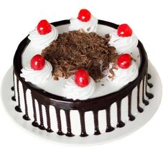 a chocolate cake with cherries on top