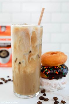 iced coffee and doughnuts are on the table