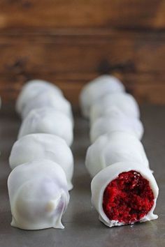 white chocolate covered in red velvet sitting on top of a table